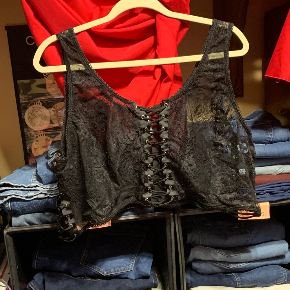 Size 5 torrid curve Black Lace-Up on front and both sides.